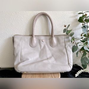 pastel pink fossil bag